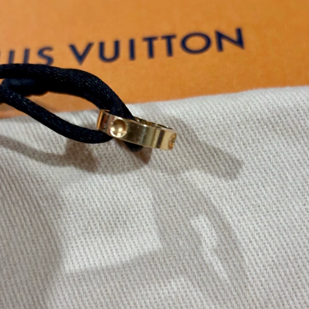 Louis Vuitton Black Cord Bracelet 18k with Yellow Gold Monogram Flower charm - Picture 5 of 5